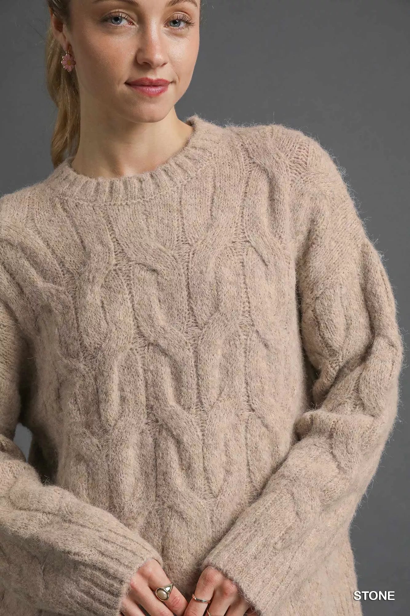 Umgee cable knit sweater in soft stone color with a cozy, textured design for casual outfits