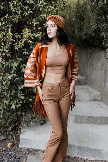 Leto Collection Aztec print fringed ruana in rust color, perfect for chic fall layering