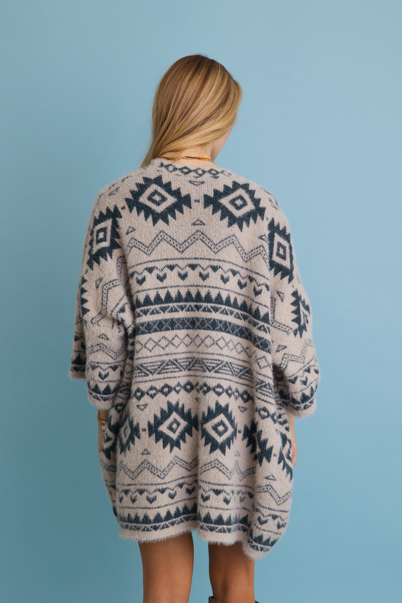 Leto Collection Aztec print knit cardigan with a cozy oversized fit and intricate tribal patterns