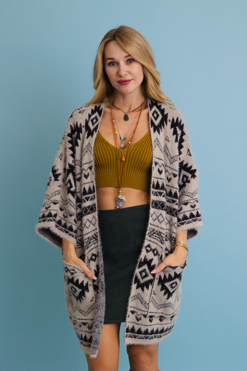 Leto Collection Aztec print knit cardigan featuring an open front and two side pockets