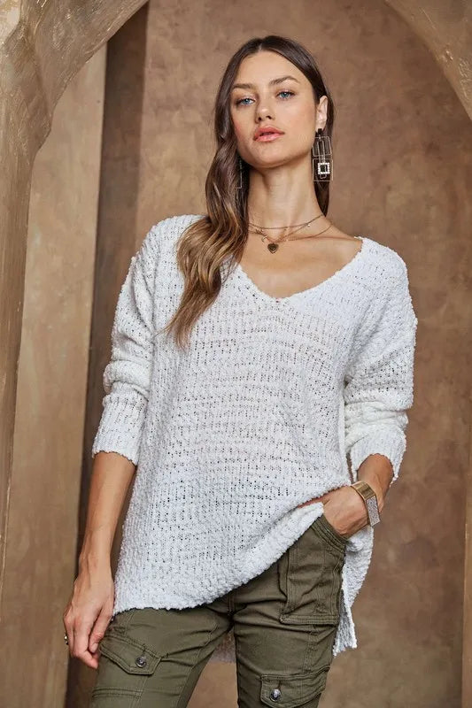 Trendsi boho v-neck sweater in white, featuring a loose knit design and relaxed fit for casual styling