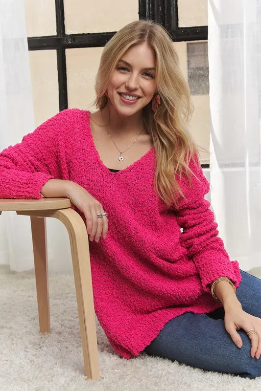 Trendsi high-low side slit sweater in bright pink, perfect for casual and stylish outfits