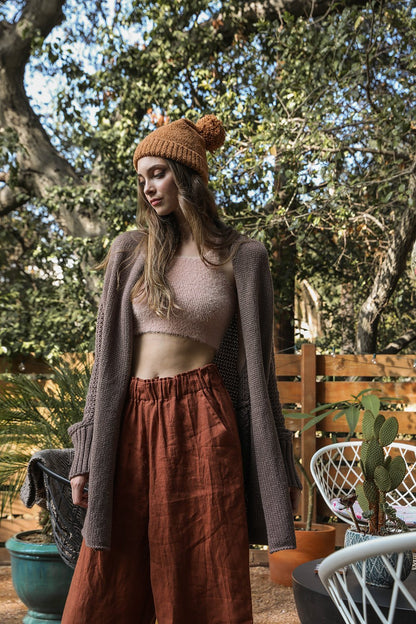 Leto Collection boho bat sleeve knit cardigan styled with a cropped top and wide-legged pants