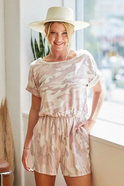 Trendsi camo print romper for women in light pink with a relaxed fit and short sleeves