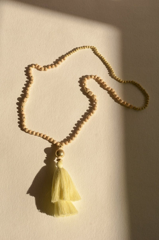 Leto Collection beaded necklace with yellow tassel on neutral backdrop Boho Necklace, Boho Chic Jewelry, Spiritual