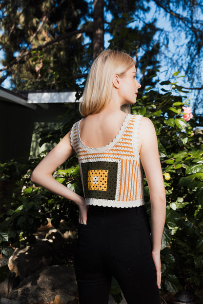 Leto Collection Bohemian Crochet Top with Colorful Square Motif in a Garden Setting