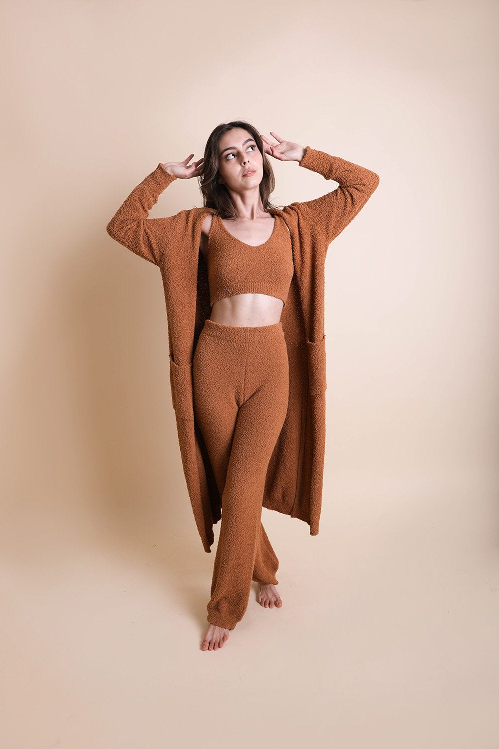 Leto Collection boho longline cardigan in earthy tones styled with matching cozy outfit