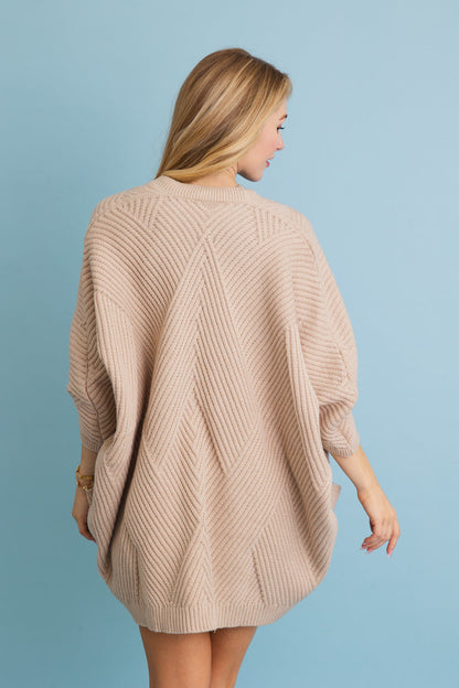 Leto Collection boho ribbed knit cardigan in beige with a stylish oversized fit and unique pattern