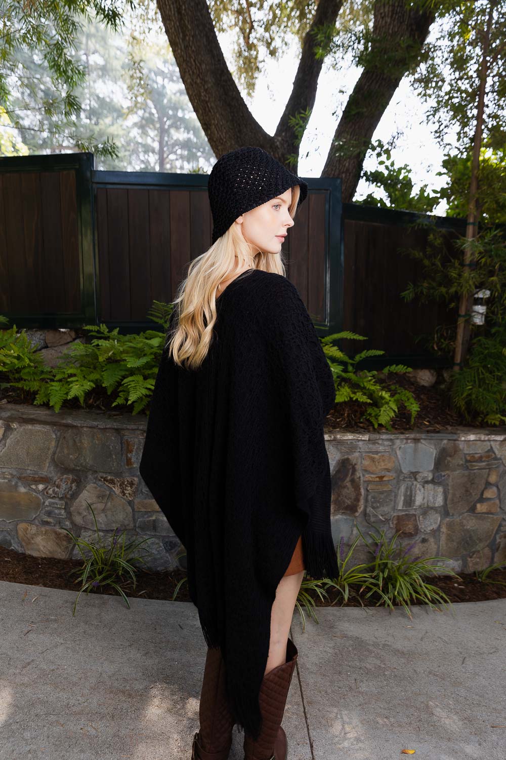 Black Leto Collection boho tassel wrap poncho perfect for stylish layering and cool weather