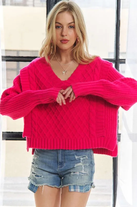 Trendsi boho ruffle detail sweater in vibrant pink, styled with distressed denim shorts