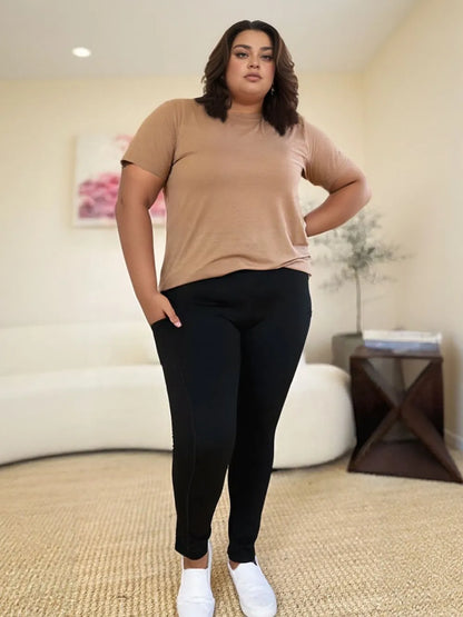 Trendy wide waistband sports leggings in black, perfect for comfort and style during workouts