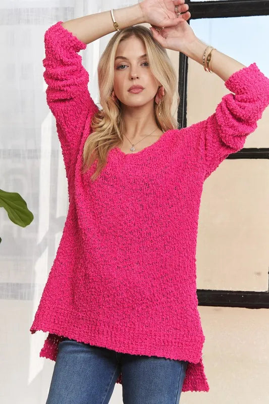 Trendsi high-low side slit sweater in vibrant pink, perfect for a stylish and comfortable look