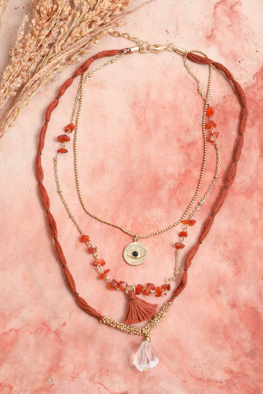 Leto Collection layered Boho Necklace, Boho Chic Jewelry, Spiritual gold chain with red stone chips, tassel and crystal pendant