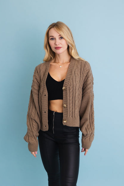 Chunky cable knit cropped cardigan in brown with oversized sleeves and button front from Leto Collection