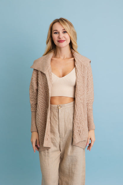 Leto Collection chunky cable knit poncho cardigan in beige, perfect for stylish layering and comfort