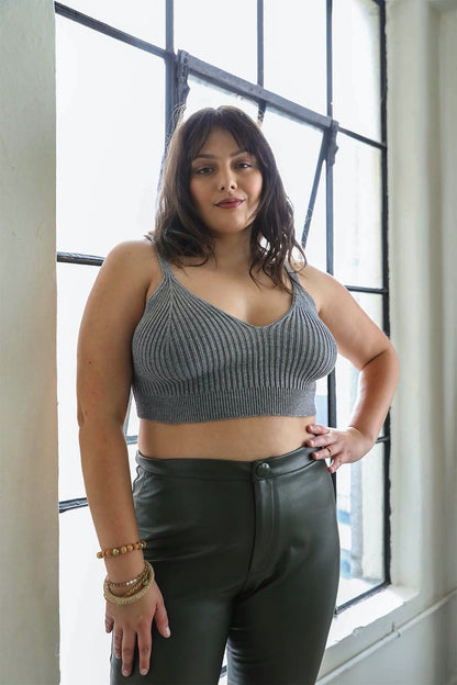 Plus size ribbed brami top in gray worn by a model with stylish high-waisted pants