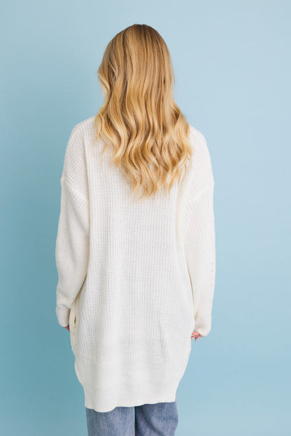 Cozy waffle knit cardigan in cream color with relaxed fit and long sleeves from Leto Collection