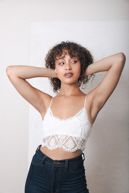 Leto Collection boho crochet bralette in white showcasing intricate crochet patterns and adjustable straps