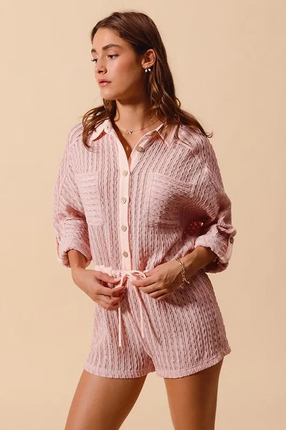 Trendsi textured knit romper for women in soft pink with button-up front and adjustable waist