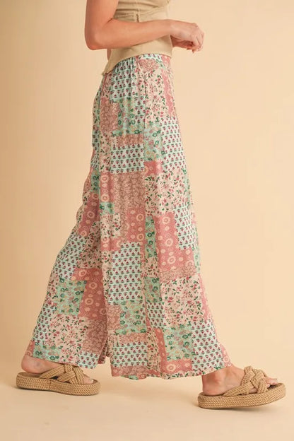 Trendy boho wide leg pants featuring a colorful patchwork design and flowy silhouette