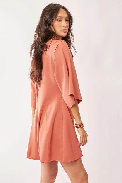 Trendsi boho skort romper for women in peach with flared sleeves and a stylish back view