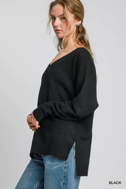 Umgee wool blend pullover sweater in black with a stylish V-neck and side slits