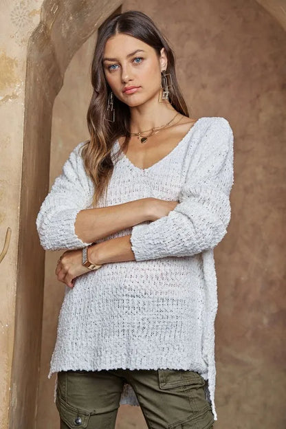 Trendsi boho v-neck sweater in white with textured knit and relaxed fit for casual styling