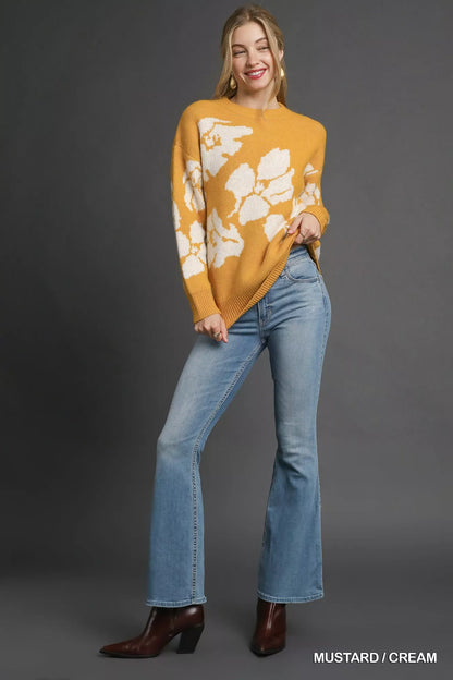 Umgee floral long sleeve sweater in mustard with cream floral pattern, styled with flared jeans
