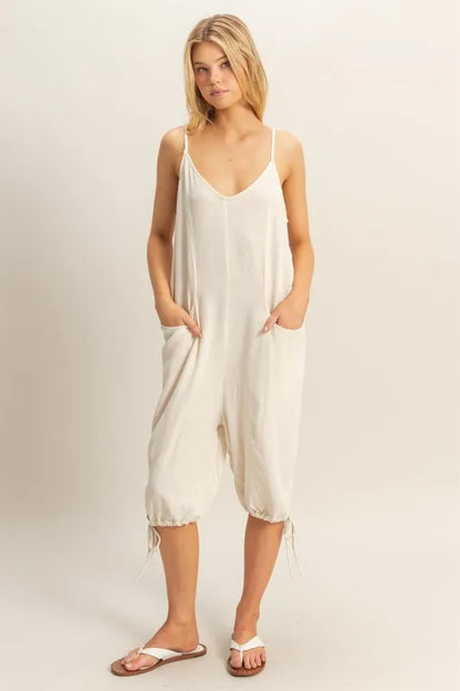 Trendsi boho v-neck romper with pockets in a lightweight fabric, perfect for summer outings