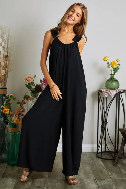 Trendsi plus size boho jumpsuit in black with a relaxed fit and adjustable straps for comfort