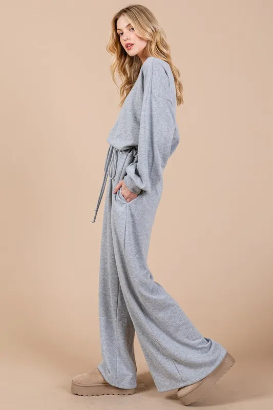 Trendsi Boho long sleeve jumpsuit in gray with relaxed fit and stylish pockets for comfort