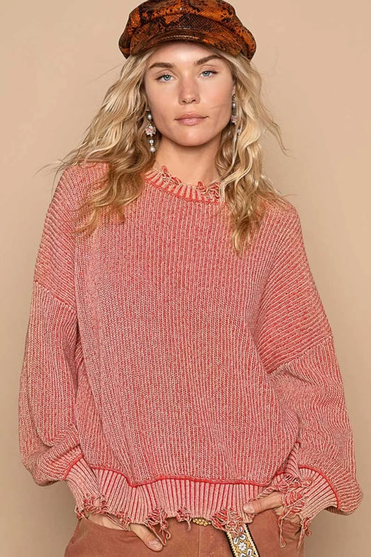 Boho distressed sweater for women in pink with ribbed texture and frayed edges for a trendy look