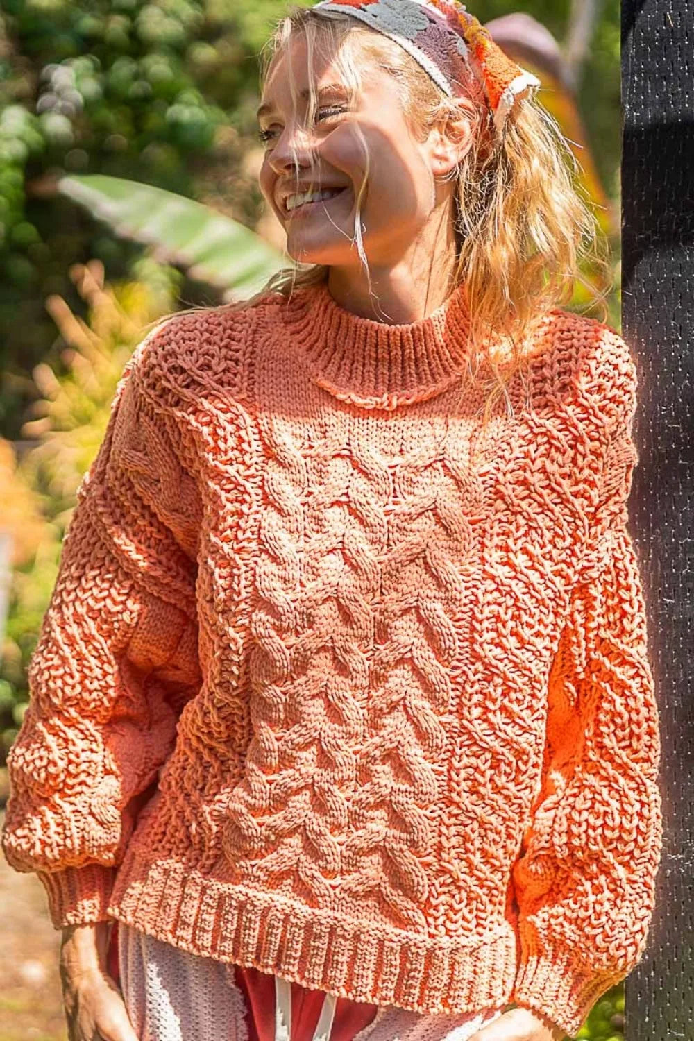 Trendsi boho cable knit sweater in peach with oversized fit and textured design for a cozy look