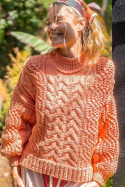 Trendsi boho cable knit sweater in peach with oversized fit and textured design for a cozy look