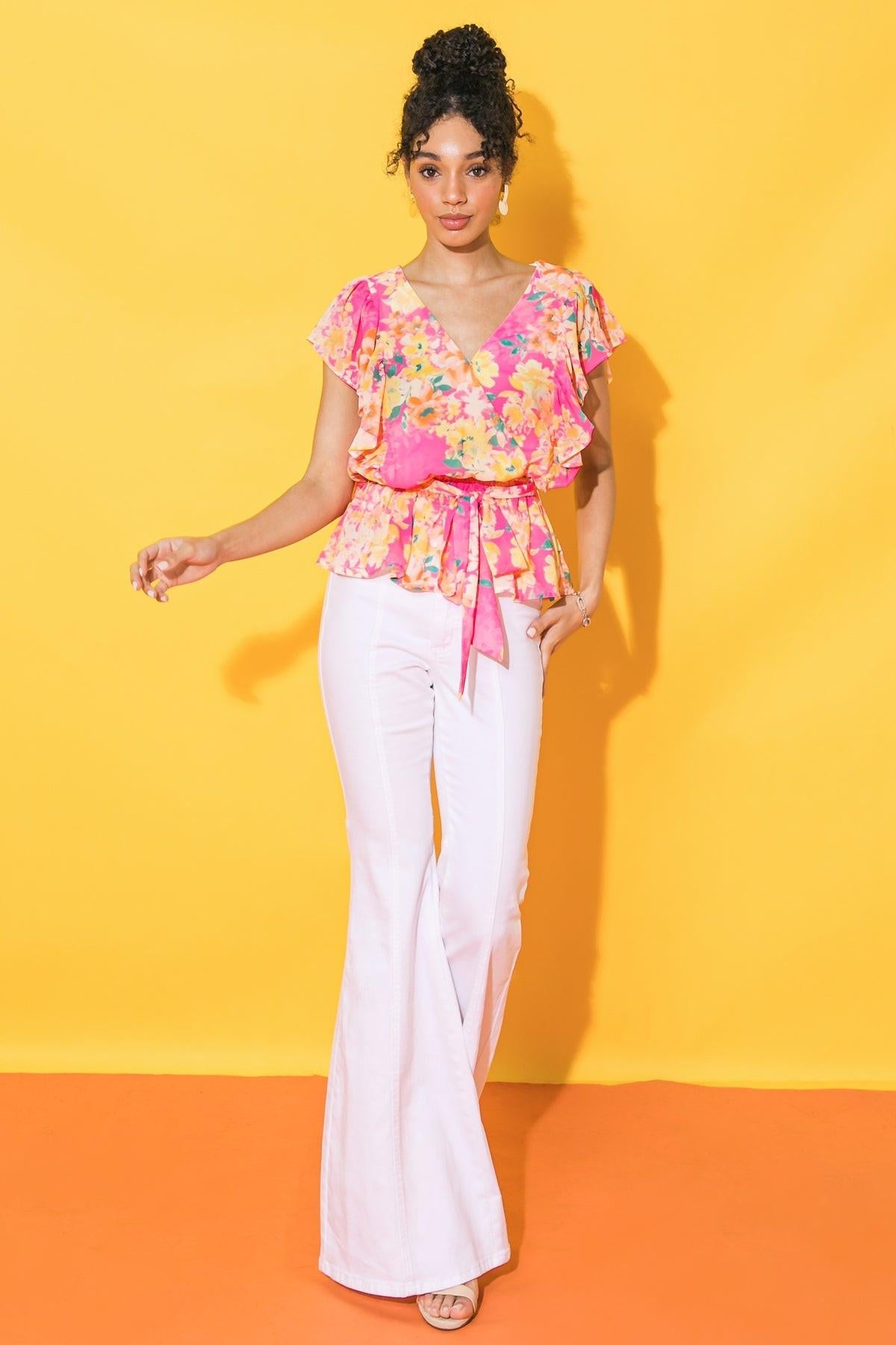 Faded View Woven Top With Surplice Neckline And Peplum Flare