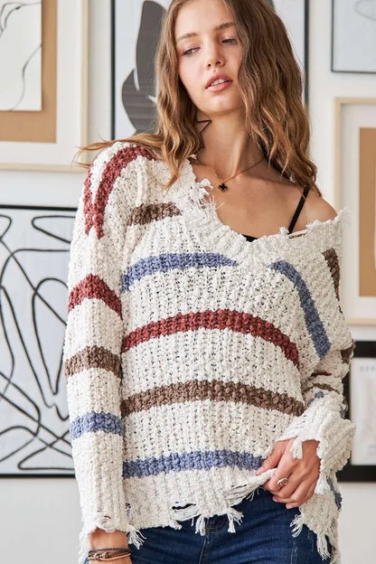 Trendsi boho striped frayed edge sweater featuring a relaxed fit and stylish striped design