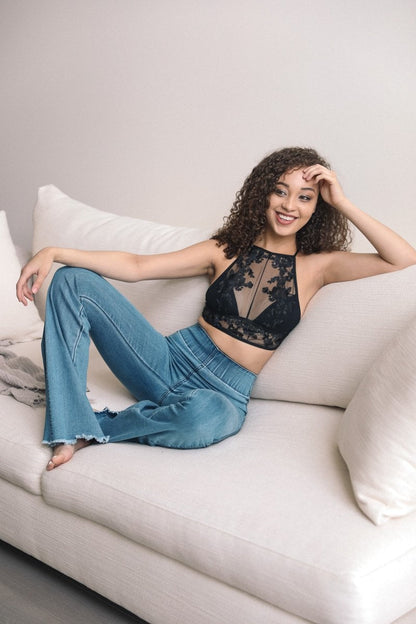 Leto Collection boho flower embroidery high neck bralette displayed with stylish jeans for a chic look