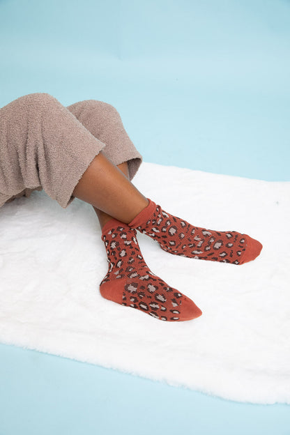 Leto Collection leopard knit socks in rust color with leopard print design for stylish comfort