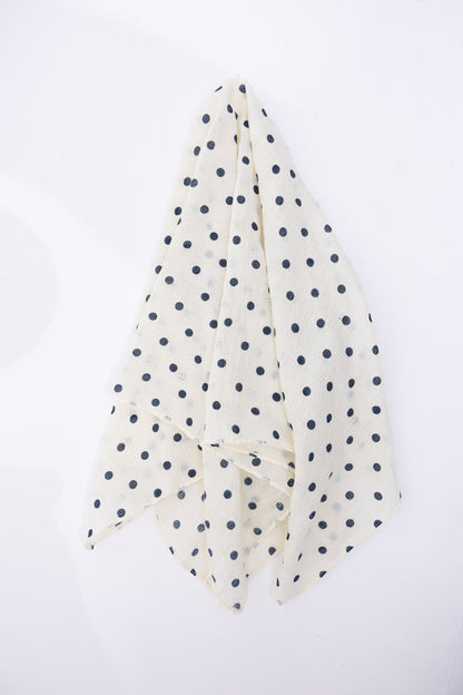 Lightweight dot neck scarf with small patterns, perfect for versatile styling.