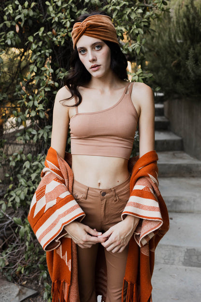 Leto Collection offset shoulder brami top in light brown, paired with a cozy shawl and stylish headband