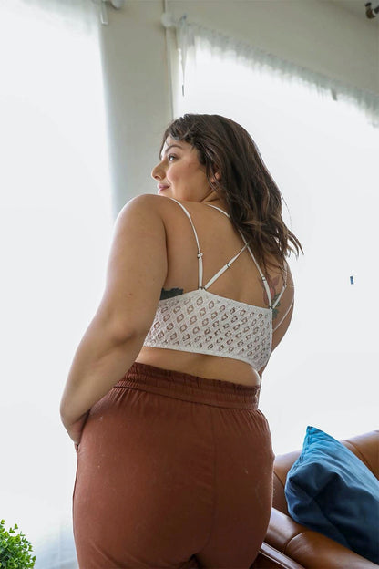 Back view of a plus size crochet bralette from Leto Collection with adjustable straps and a stylish design