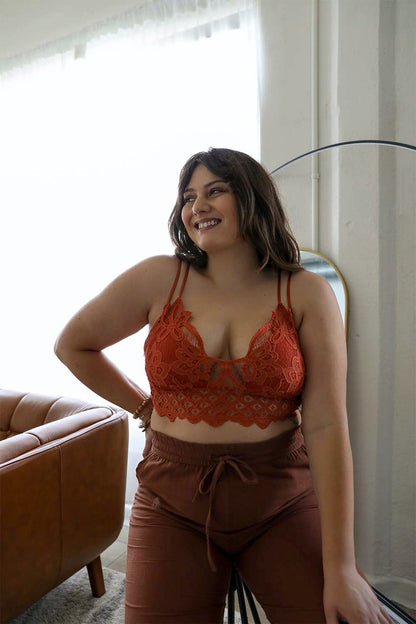 Plus size crochet bralette in rust color featuring intricate lace detailing for a stylish look