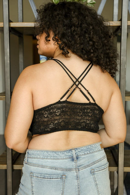 Plus size crochet bralette in black with crisscross straps and lace detailing for stylish comfort