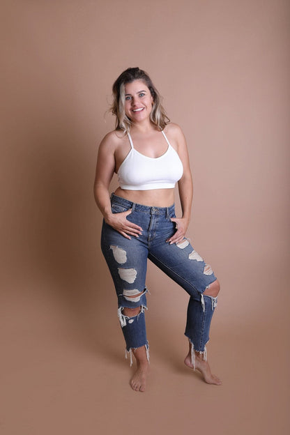 Leto Collection Plus Size Tattoo Back Bralette paired with distressed jeans for a stylish look