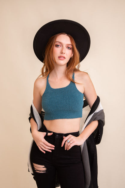 Leto Collection boho racerback brami top in teal worn with black distressed jeans and a stylish hat