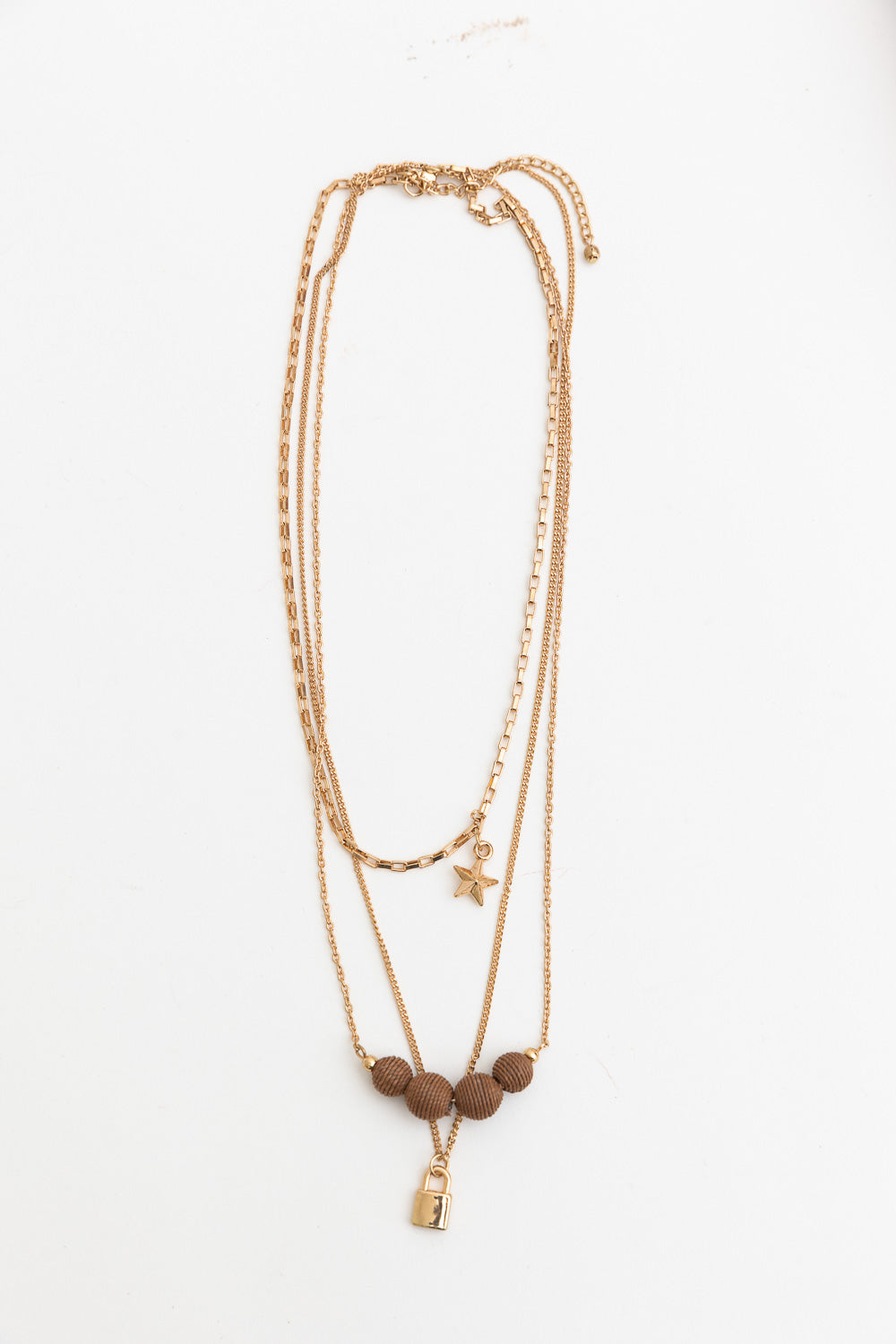Leto Collection layered gold Boho Necklace, Boho Chic Jewelry, Spiritual with star charm wood beads and padlock pendant