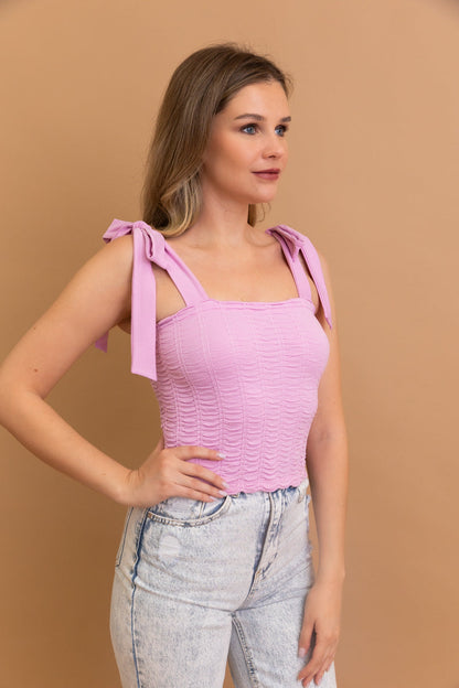 Leto Collection seamless smocked tie shoulder top in pink with adjustable straps and textured design