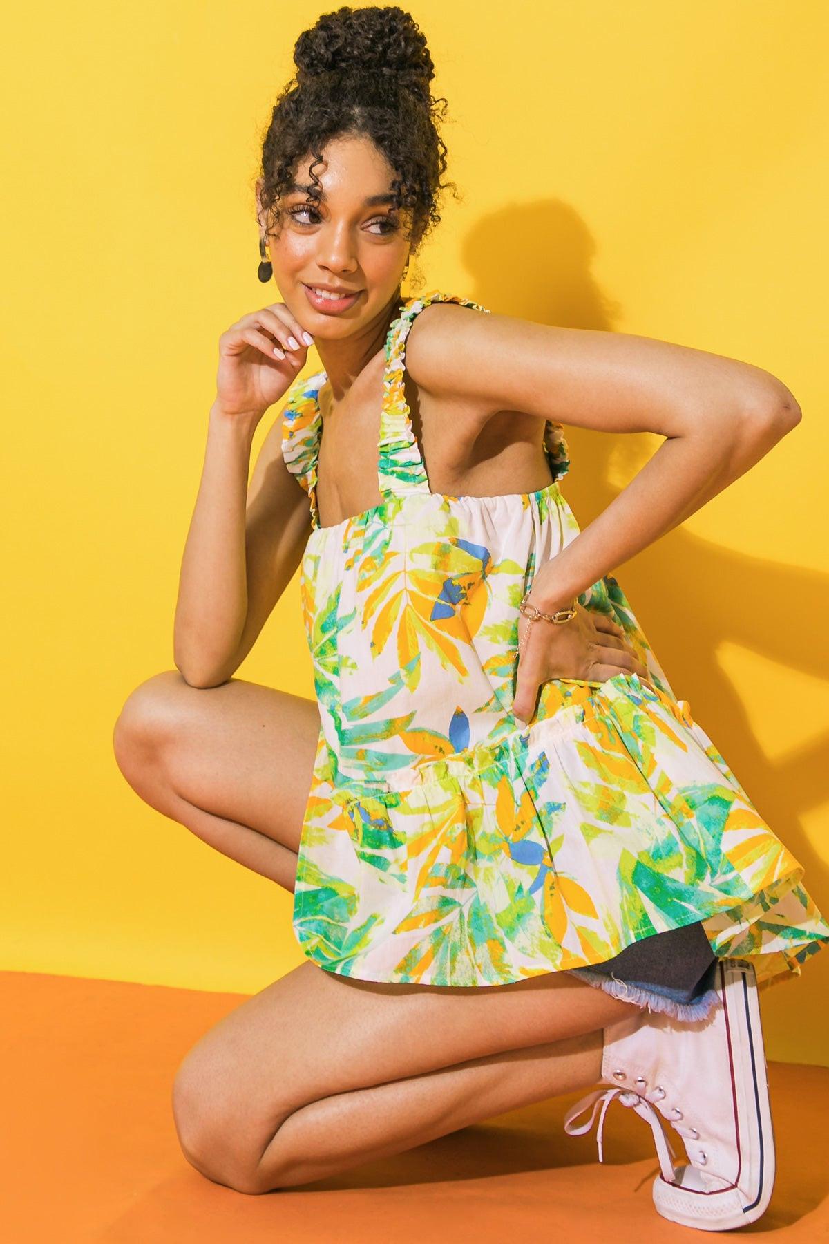 Ocean Skies Printed Woven Top With Straight Neckline And Ruffled Hem