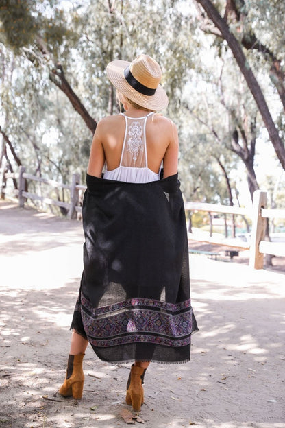 Leto Collection boho tattoo back slip dress featuring a delicate lace design and paired with a shawl and boots