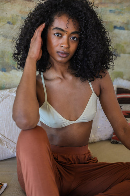 Leto Collection boho triangle bralette in light green, perfect for a relaxed and stylish look